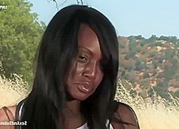 Ebony Babe With A Beautiful Smile Is About To Have An Outdoor Threesome With White Guys