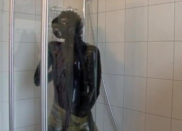 Young Latex Fetish Girl Fully Rubberized With Pisspants And Gasmask