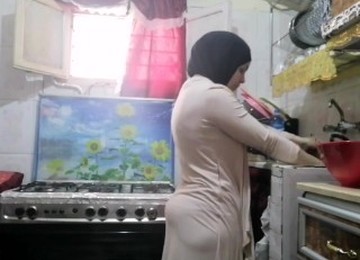 Routine Hijab Arabic Muslim In Kitchen