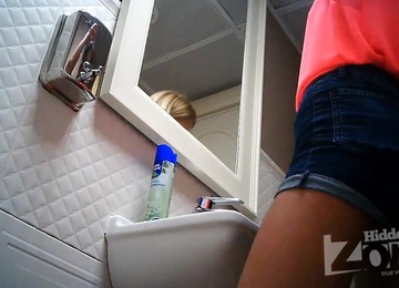 Two Young Babes With Round Ass In A Toilet.