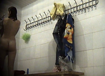 Cute Brunette College Girl In The Locker Room Filmed Topless