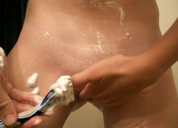 Skinny White Girl Shaves Her Pubic Area On Home Video