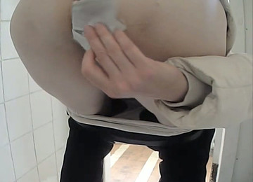 White Amateur Chick In Black Pants Pissing In The Toilet