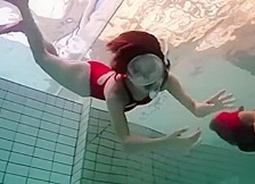 Asian Babe Swimming Underwater