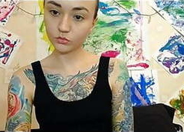 Tattooed Girl In Black Leggings