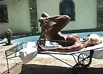 Hot Chick Outdoors In A Shiny Gold Bikini