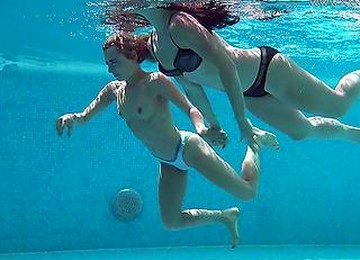 Two Bikinis Girls Get Naked In The Pool For A Swim