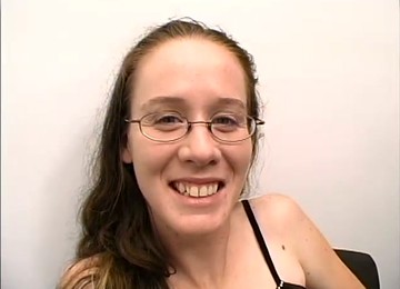 Nerdy Girl In Glasses Gives A Blowjob In An Office