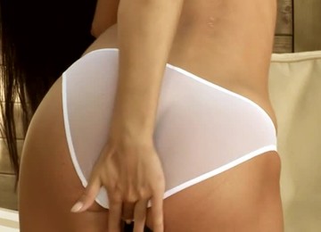 Dark Haired Beauty & Her Yellow Dildo.