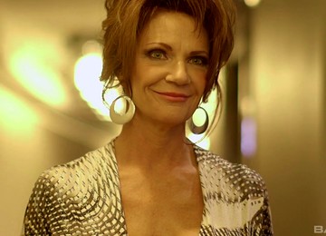 Lingerie-clad Cougar With Massive Fake Tits Sucking A Big Black Cock