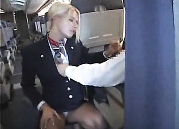 Sexy Stew Sucking And Stroking Dick On Plane