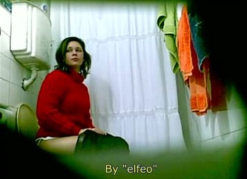 Pretty Brunette MILF Peeing On The Spy Camera In A Toilet