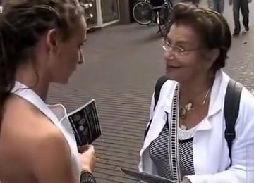 Sales Promoters Have Visible Asses While Interviewing Strangers