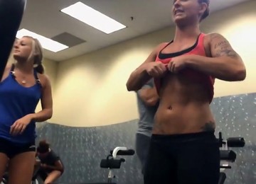 Fitness Girls Comparing Muscles