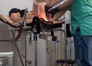 Girl In A Black Mask. Exam In Gyno Chair