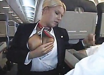 Stewardess Makes His Cock Feel Good