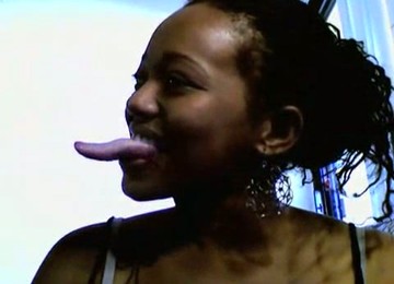 Damn! That Ebony Webcam Babe Has A Very Long Tongue!