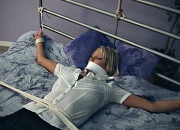 Hanna Hilton Tied Under Axe