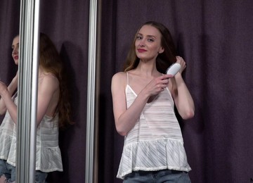 Modest Babe Milena Tissen Is Combing Her Long Hair And Masturbating Pussy