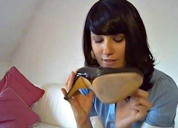 Woman Sniffs Own Shoe