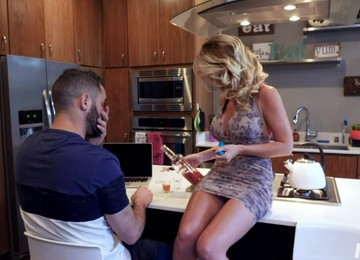 Stepson Takes A Shot From Stepmom's Boobies And Fucks Her Cunt In The Kitchen