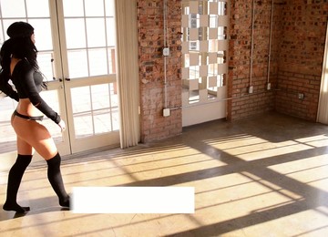 Sexy Solo Model Does Some Stretching Wearing Just A Thong