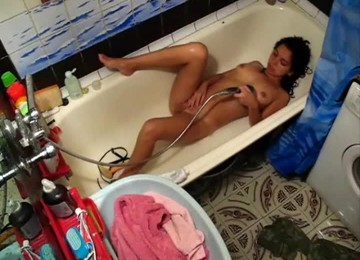 Brunette Masturbates In The Hot Tub.