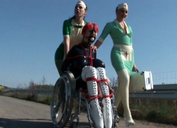 The Poor Patient Suffers From A Latex Allergy, Also Her Can Be Helped In The Clinic By The Two Rubber Nurses