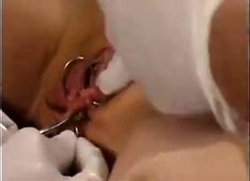 Slave Getting Pierced.