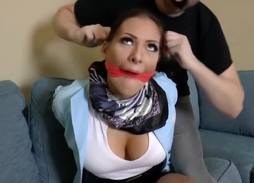 Big Titted Flight Attendant Is Tied Up And In The Mood For Some Kinky Stuff