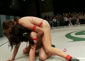 Two Brunettes In Red Bikini Wrestle In A Ring