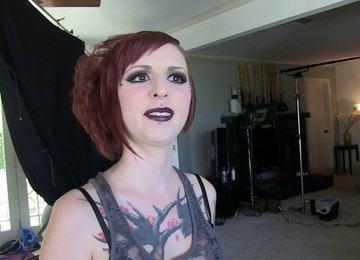 A Babe With A Shaved Head And Tattoos Shows Off Her Great Body