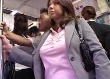 Chick Gives A Handjob On The Bus