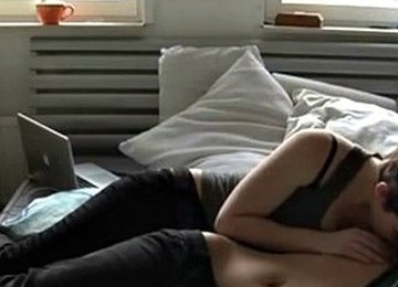 Two Teenagers Touch Each Other In Their Room.