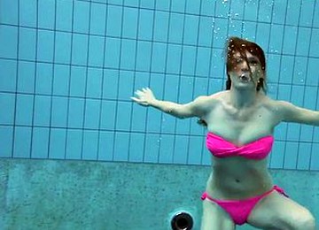Beauty In A Pink Swimsuit Lera Shows A Naked Body Under Water