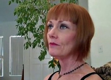 Short Haired Redhead Granny Gives Blowjob