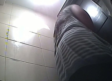 Brunette Curvaceous Amateur Woman In The Toiletroom Flashes Her Huge Booty